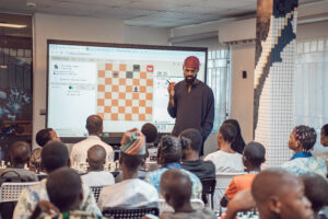 Tunde Onakoya teaching chess